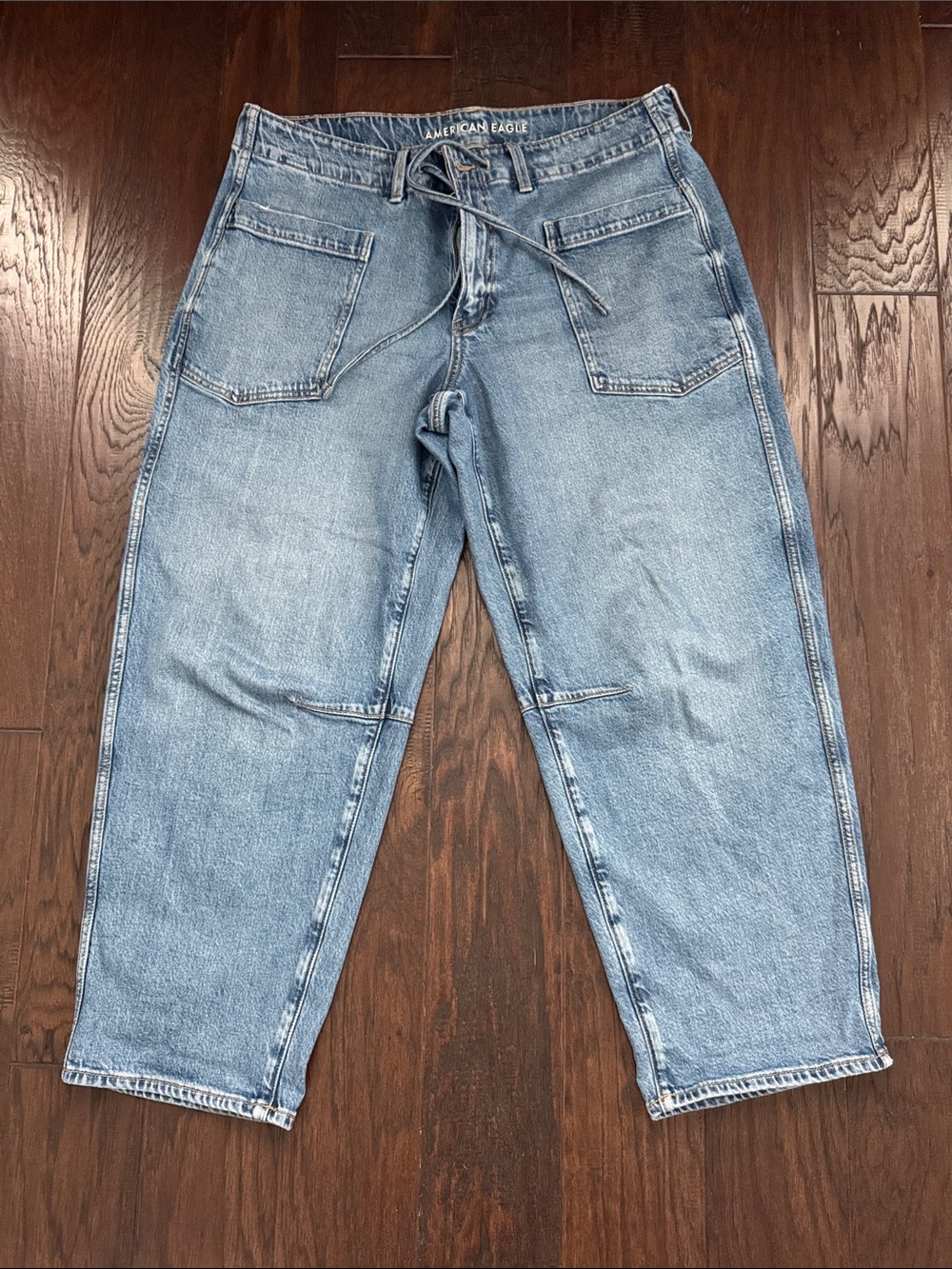 American Eagle Outfitters Light Wash Wide Leg Barrel Jeans with Drawstring